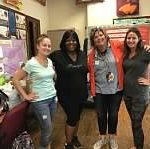 Meredith, Principal Thomas, and 2 women who made donations of school supplies to our school